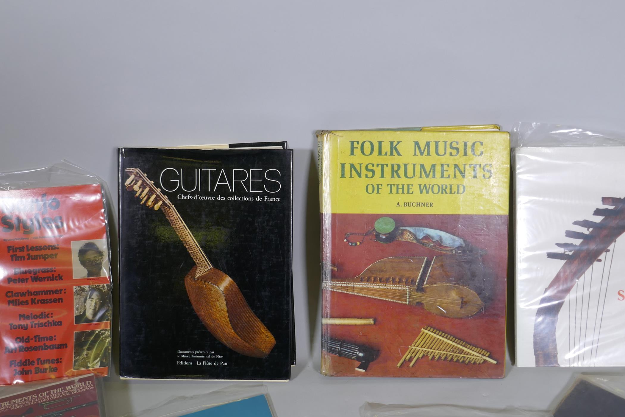 A collection of books, musical instruments, folk and African, guitars and instruction manuals - Image 3 of 5
