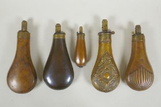 A collection of five antique bronze and brass powder flasks including two by James Dixon & Sons