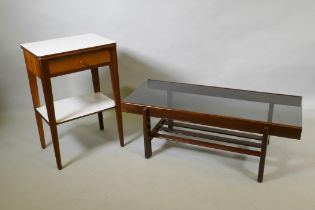 A mid century sapele wood two tier coffee table with tinted glass top, 100 x 44 x 36cm, and single