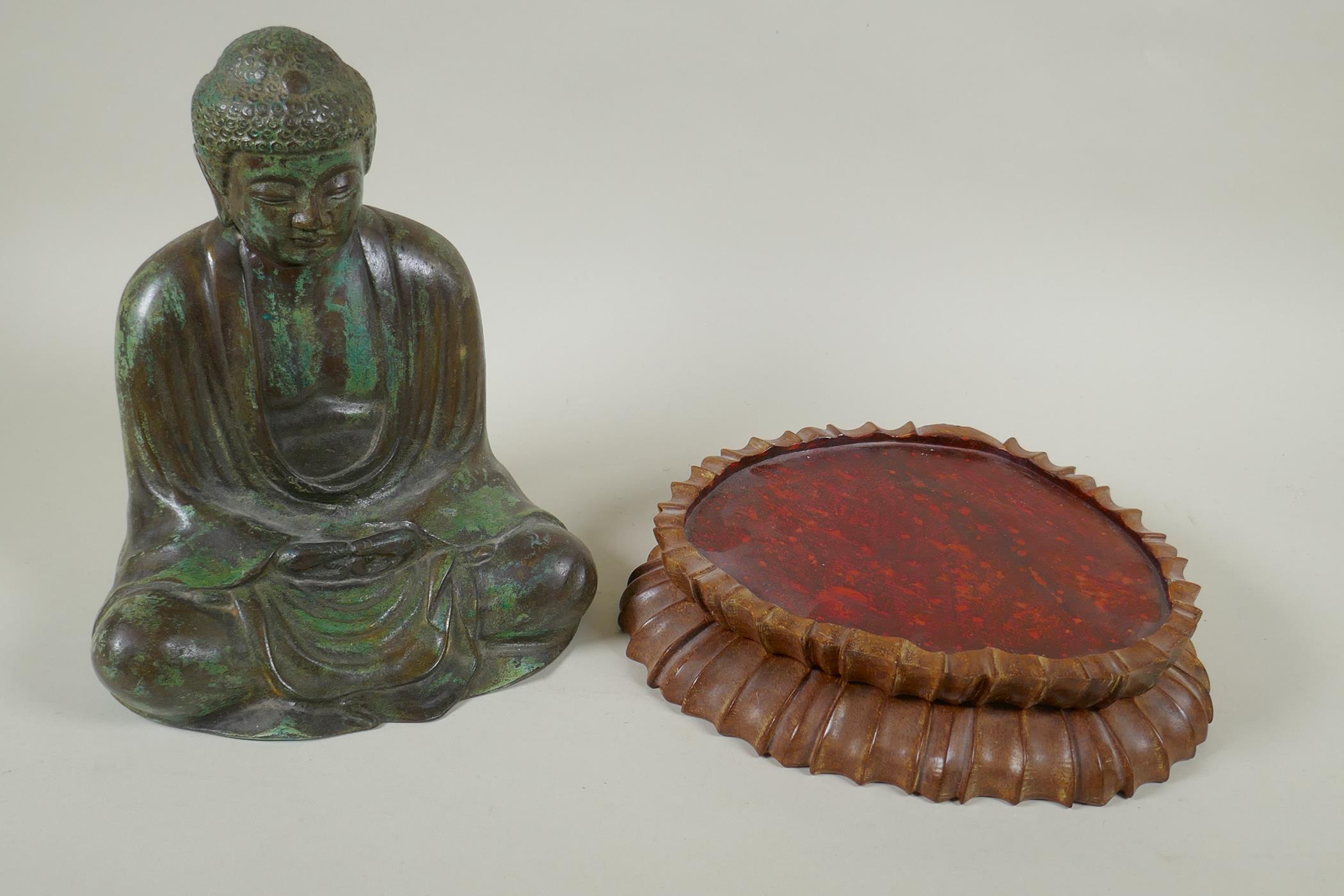 A Chinese patinated bronze figure of Buddha seated in meditation, on a carved hardwood stand, 31cm - Image 4 of 4