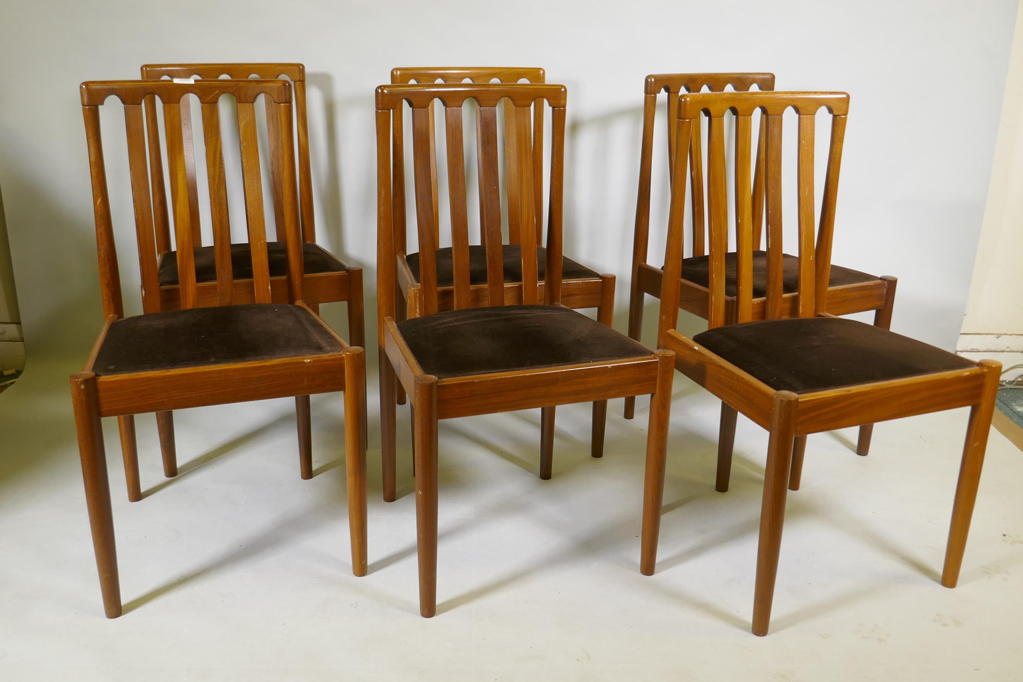 A set of six mid century Meredew teak slat back dining chairs