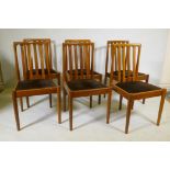 A set of six mid century Meredew teak slat back dining chairs