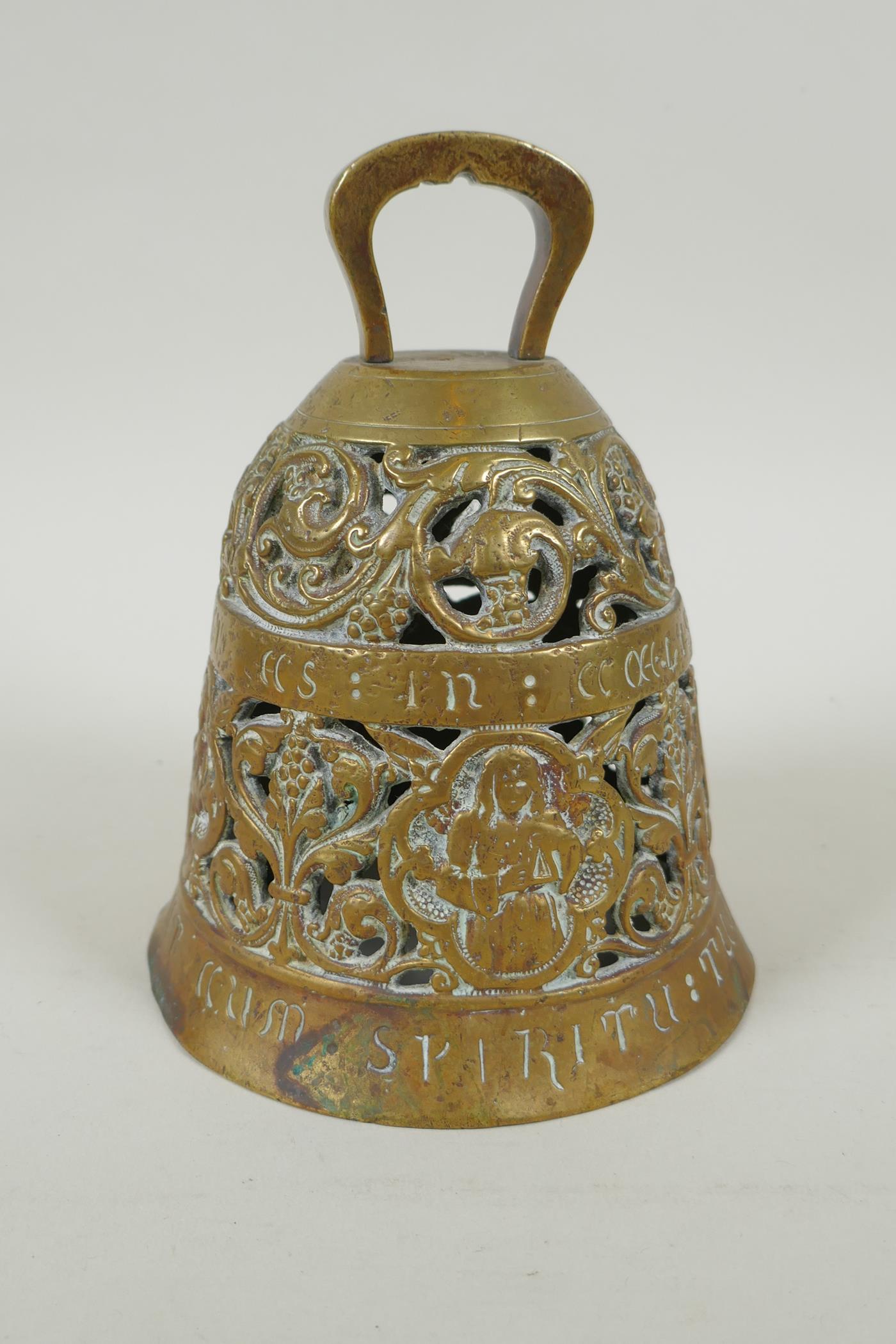 An antique pierced bronze prayer bell decorated with depictions of angelic musicians and Catholic - Image 4 of 6