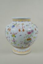 A Chinese polychrome porcelain vase decorated with bats and vases of flowers, GuangXu 6 character