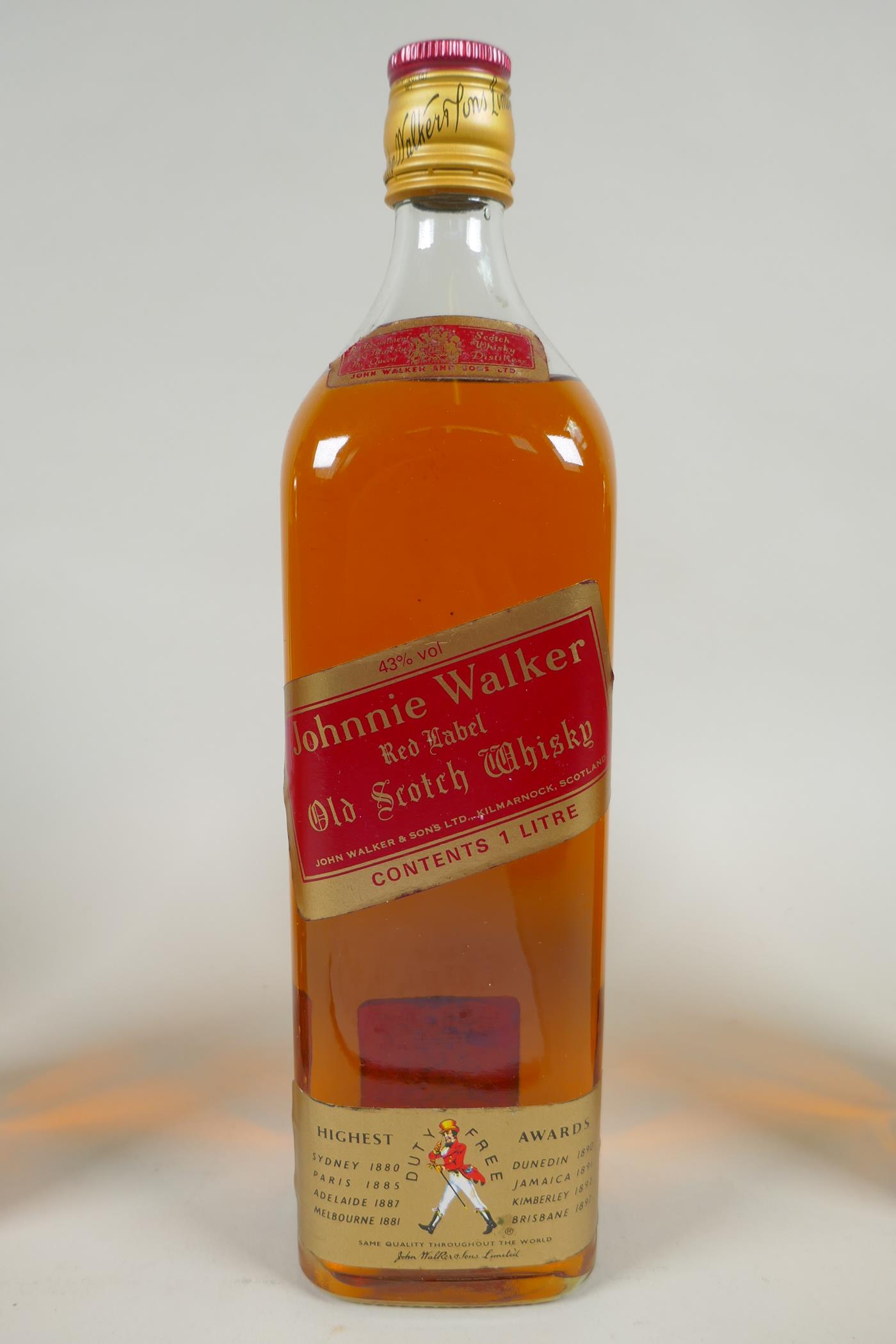 Four vintage bottles of spirits, to include two bottles of Johnnie Walker Red Label Old Scotch - Image 2 of 5