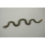 A Japanese Jizai style articulated polished bronze okimono snake, 40cm long