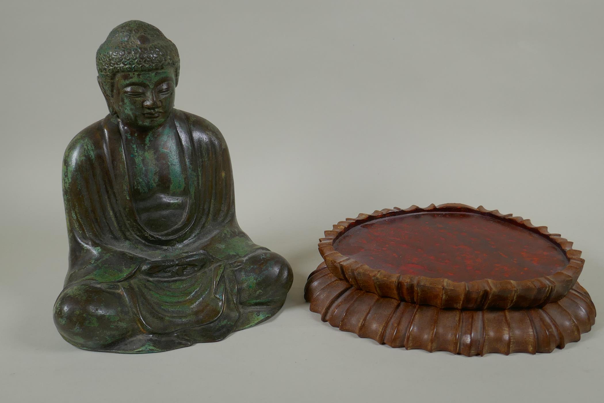 A Chinese patinated bronze figure of Buddha seated in meditation, on a carved hardwood stand, 31cm - Image 3 of 4