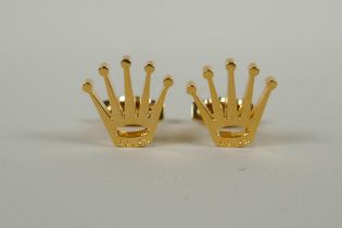 A pair of gilt metal Rolex style cuffliffnks