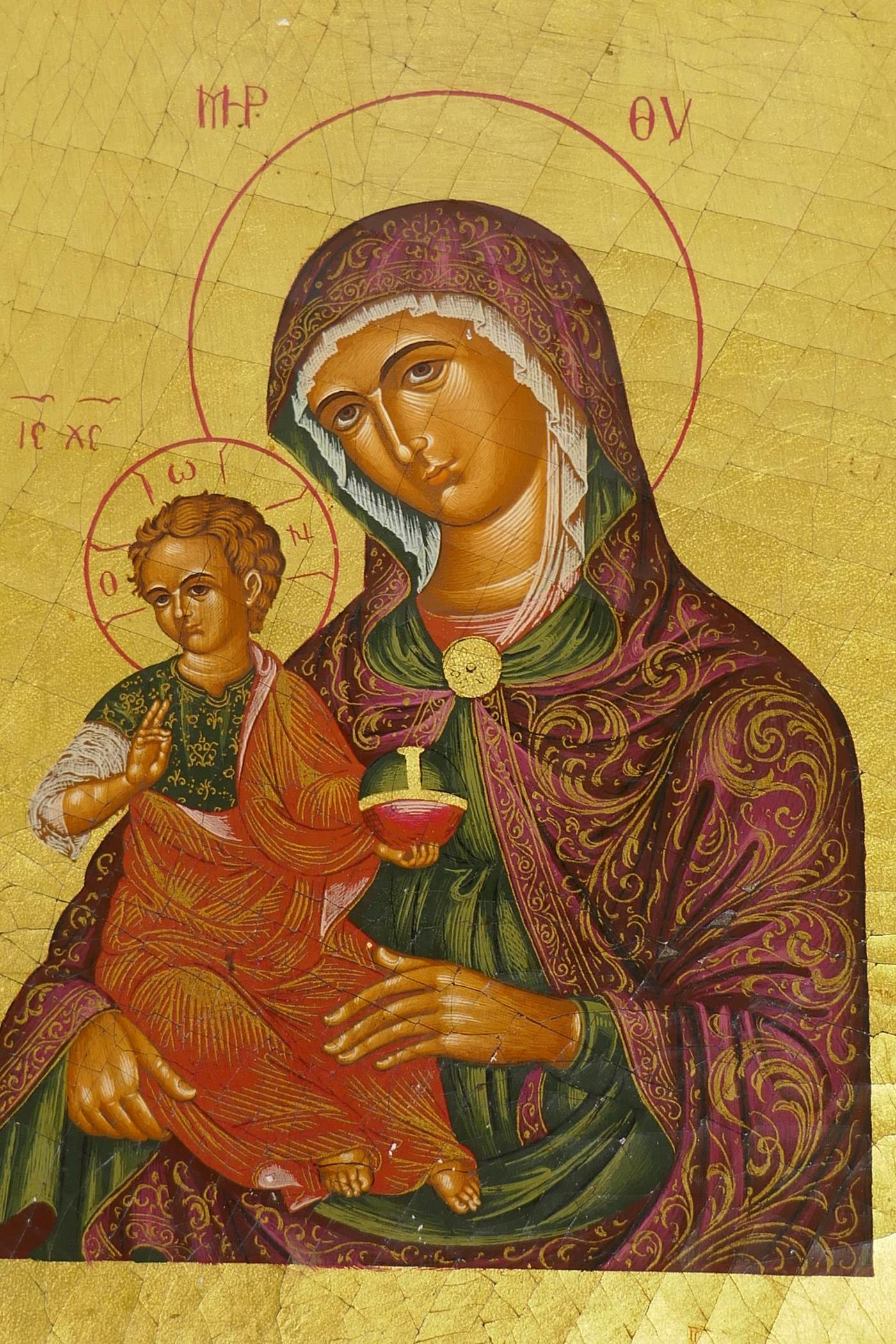 A hand painted and gilded icon, late C20th, 15 x 19cm - Image 2 of 3