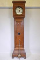 C19th Continental oak 30hr longcase clock with enamel dial and Roman numerals, 234cm high