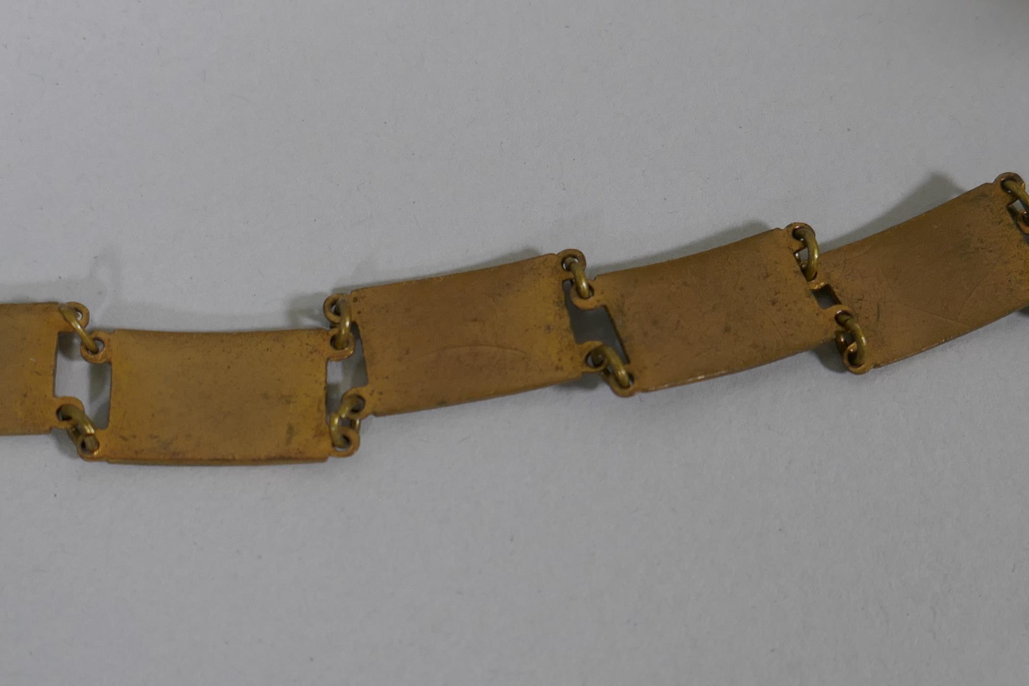 A contemporary enamel on white metal expanding bracelet, a silver bracelet and a gilt metal and - Image 5 of 5