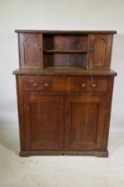 A C19th mahogany chiffonier, with two cupboards flanking a pen shelf, and a single drawer over two