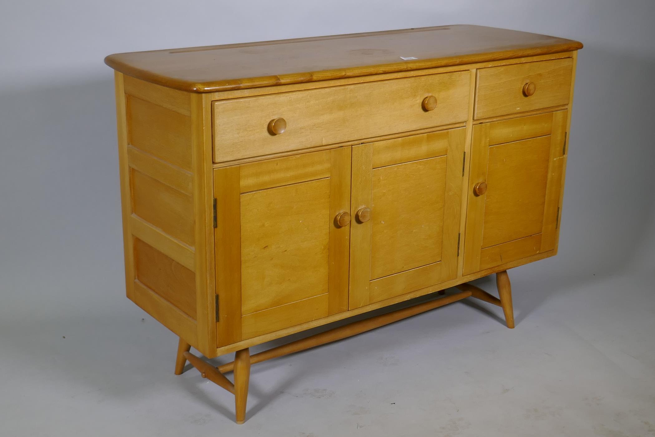 An Ercol Model 351 beech and elm top sideboard, with two drawers, one fitted with cutlery slide, - Image 3 of 4