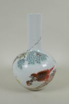 A Chinese polychrome porcelain bottle vase decorated with birds perched on a branch, character