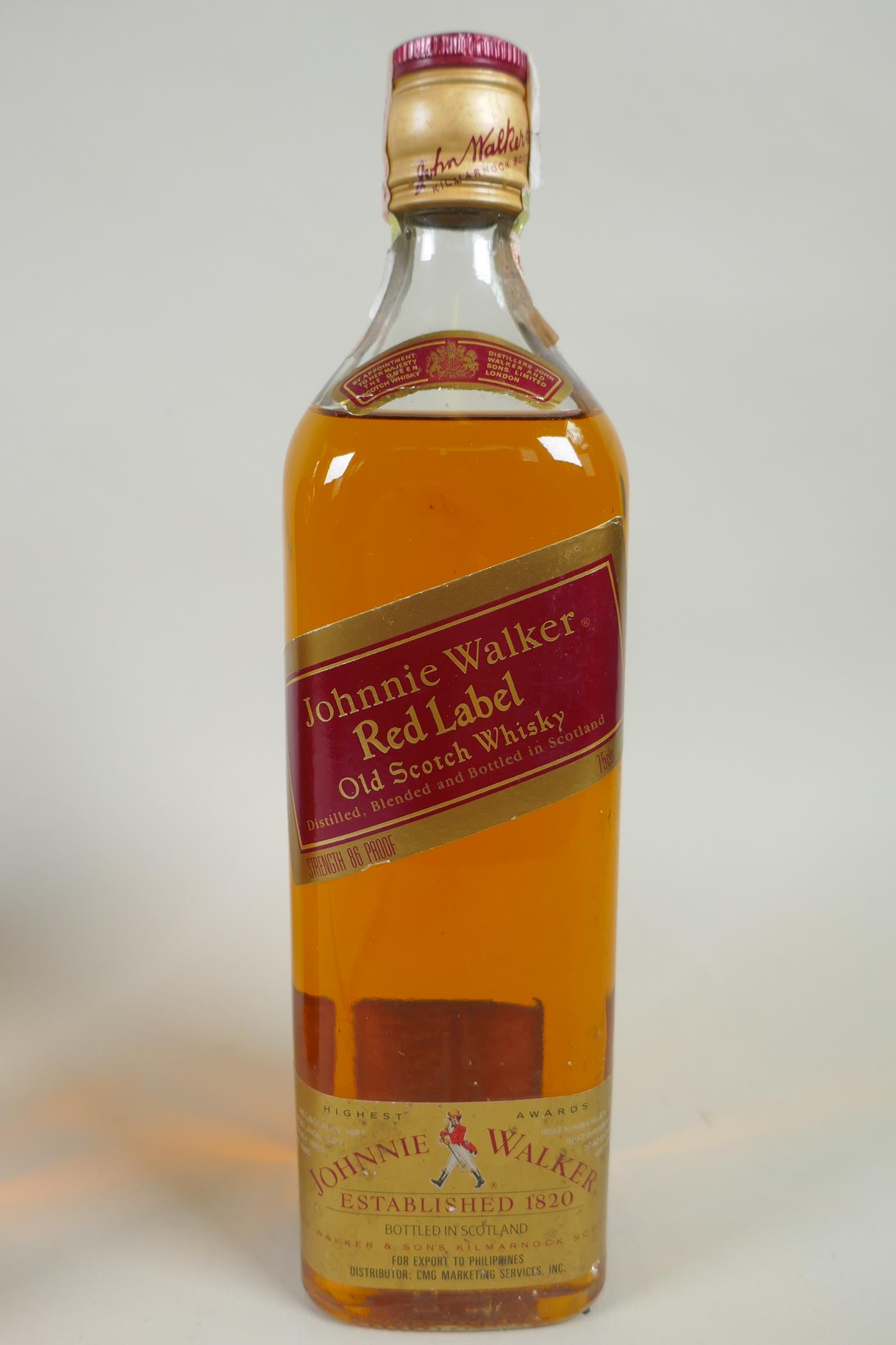 Four vintage bottles of spirits, to include two bottles of Johnnie Walker Red Label Old Scotch - Image 3 of 5