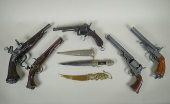 Five replica pistols, including a French Lefaucheux pinfire revolver and a Colt model 1851, and