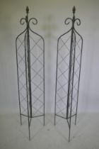 A pair of trifold metal garden trellis towers, 165cm high