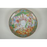A C19th Chinese Canton famille rose porcelain charger for the Persian market, decorated with figures