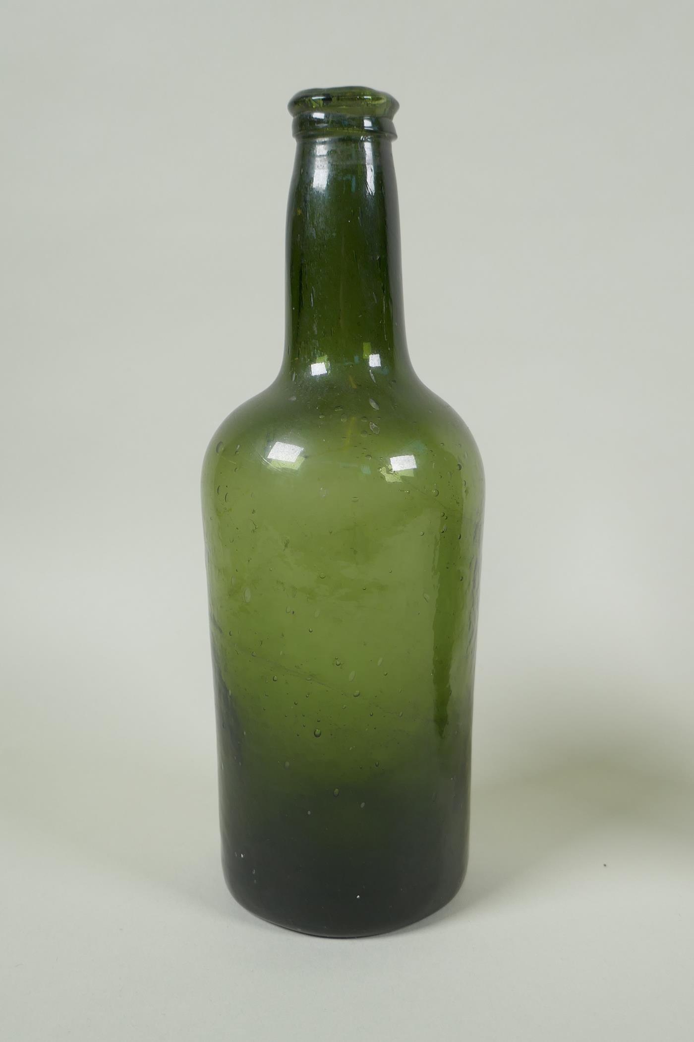Three C19th green glass wine bottles, 26cm highest - Image 2 of 4