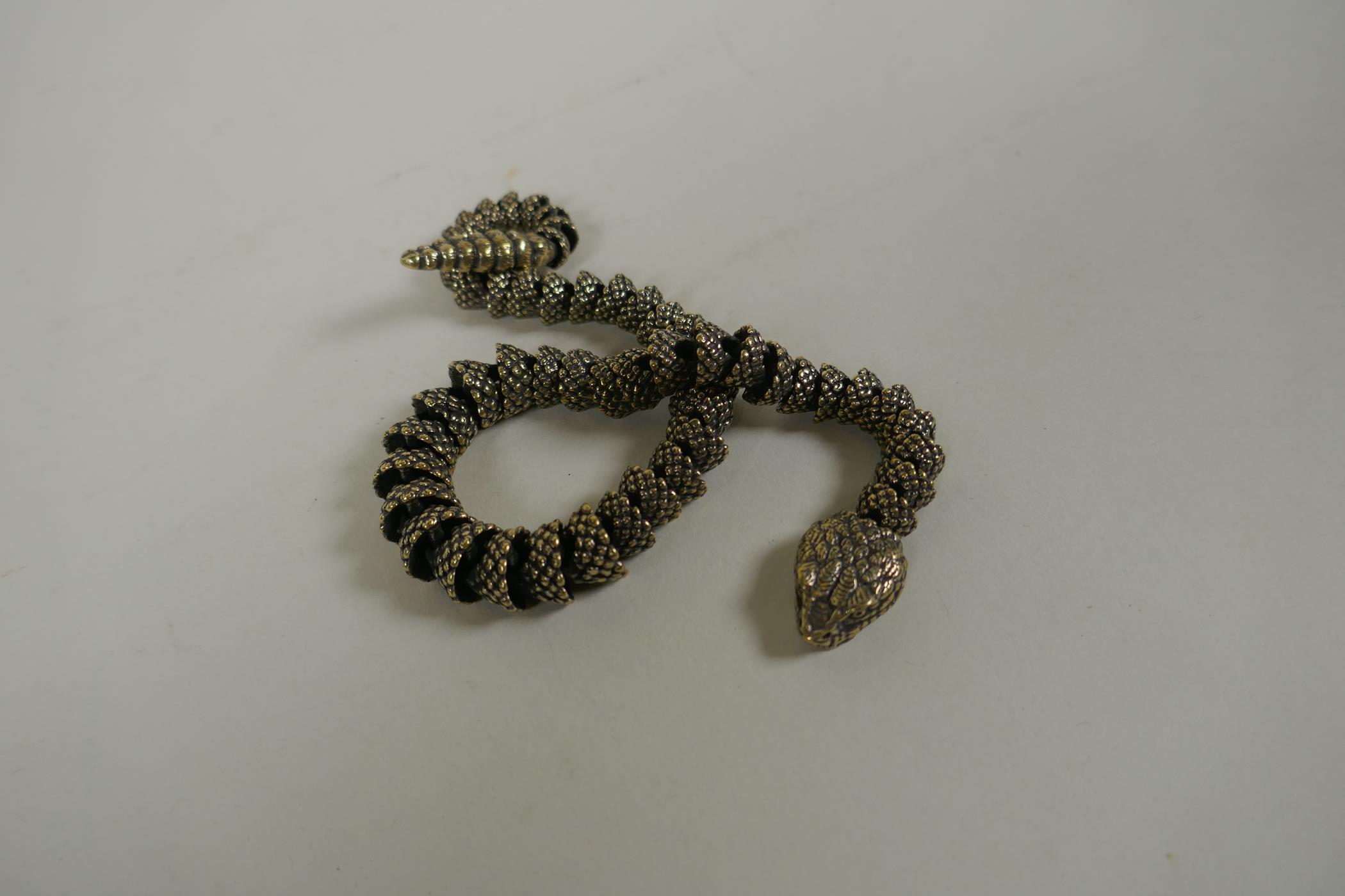 A Japanese Jizai style articulated polished bronze okimono snake, 40cm long - Image 6 of 6