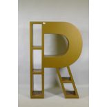 A bespoke painted wood bookcase in the shape of the letter R, 83 x 24cm, 120cm high