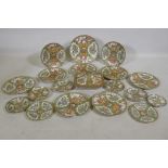 A collection of Cantonese famille verte export ware porcelain, largest plate 25cm diameter