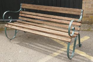 A painted wrought iron slatted garden bench, 152cm wide