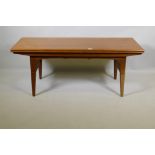 A Danish mid century teak Elevator coffee/dining table, designed by Kai Kristiansen for Vildbjerg