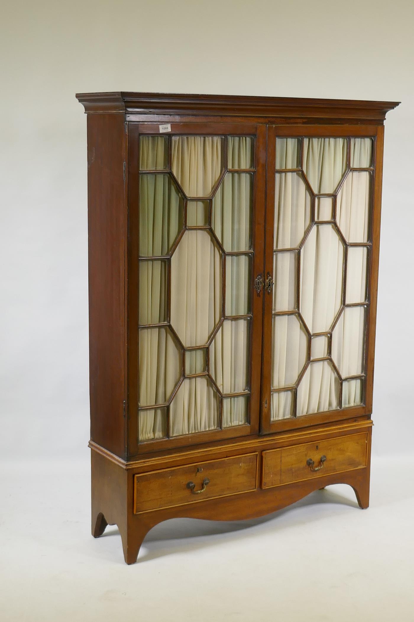 A Victorian mahogany bookcase with two astragal glazed doors over two drawers, raised on shaped - Image 2 of 2