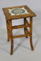 An antique Oriental bamboo occasional table inset with an Iznik tile top, 30 x 30cm, 47cm high