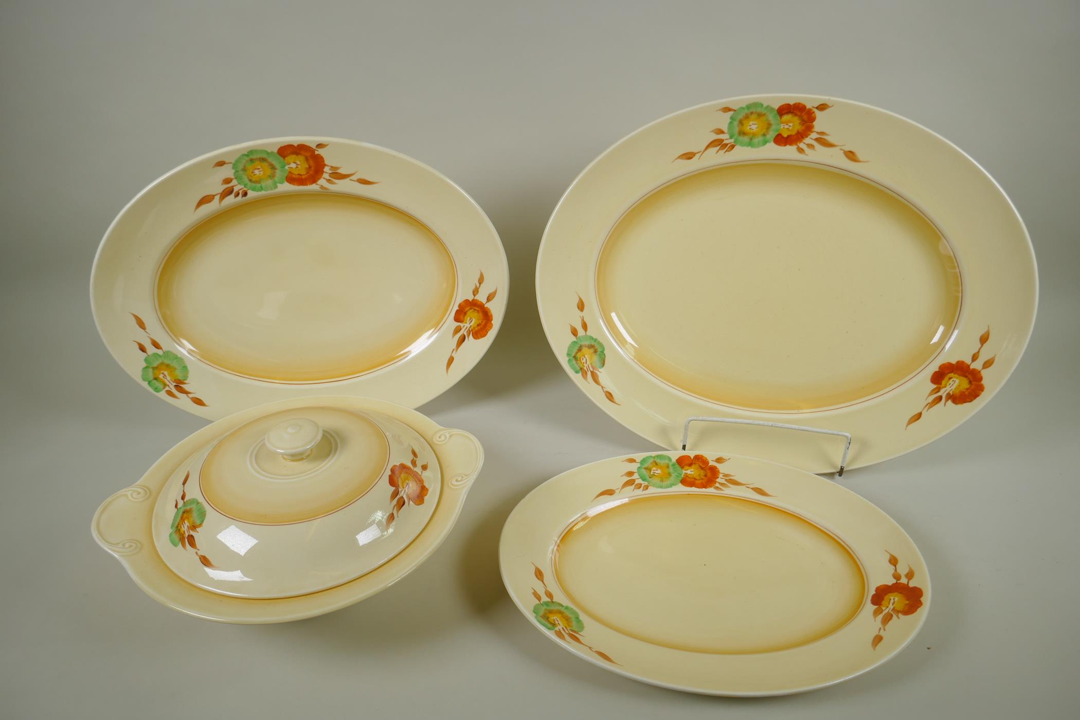 A set of Newport Pottery Clarice Cliff Corolla pattern oval serving dishes and tureen, largest 41