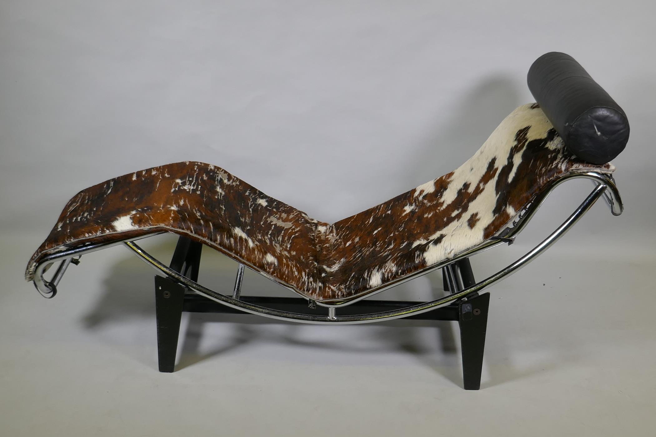 After Corbusier, a Cassina type LC4 chaise longue, upholstered in pony hide on a chrome frame and - Image 2 of 2