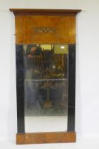 A C19th Continental secessionist style mahogany pier glass with ebonised decoration and ormolu