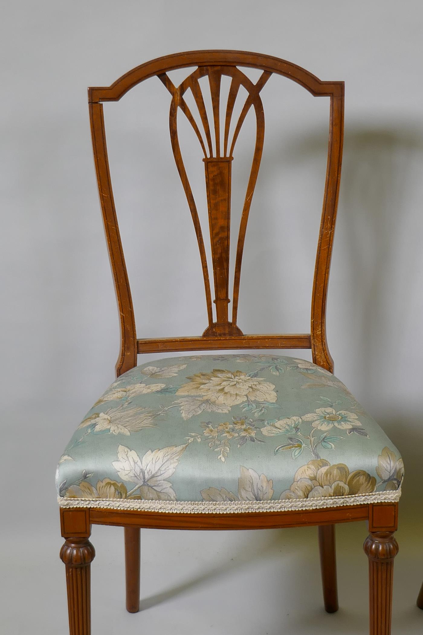 A pair of Victorian satinwood bedroom side chairs with pierced splats, raised on reeded supports ( - Image 3 of 3