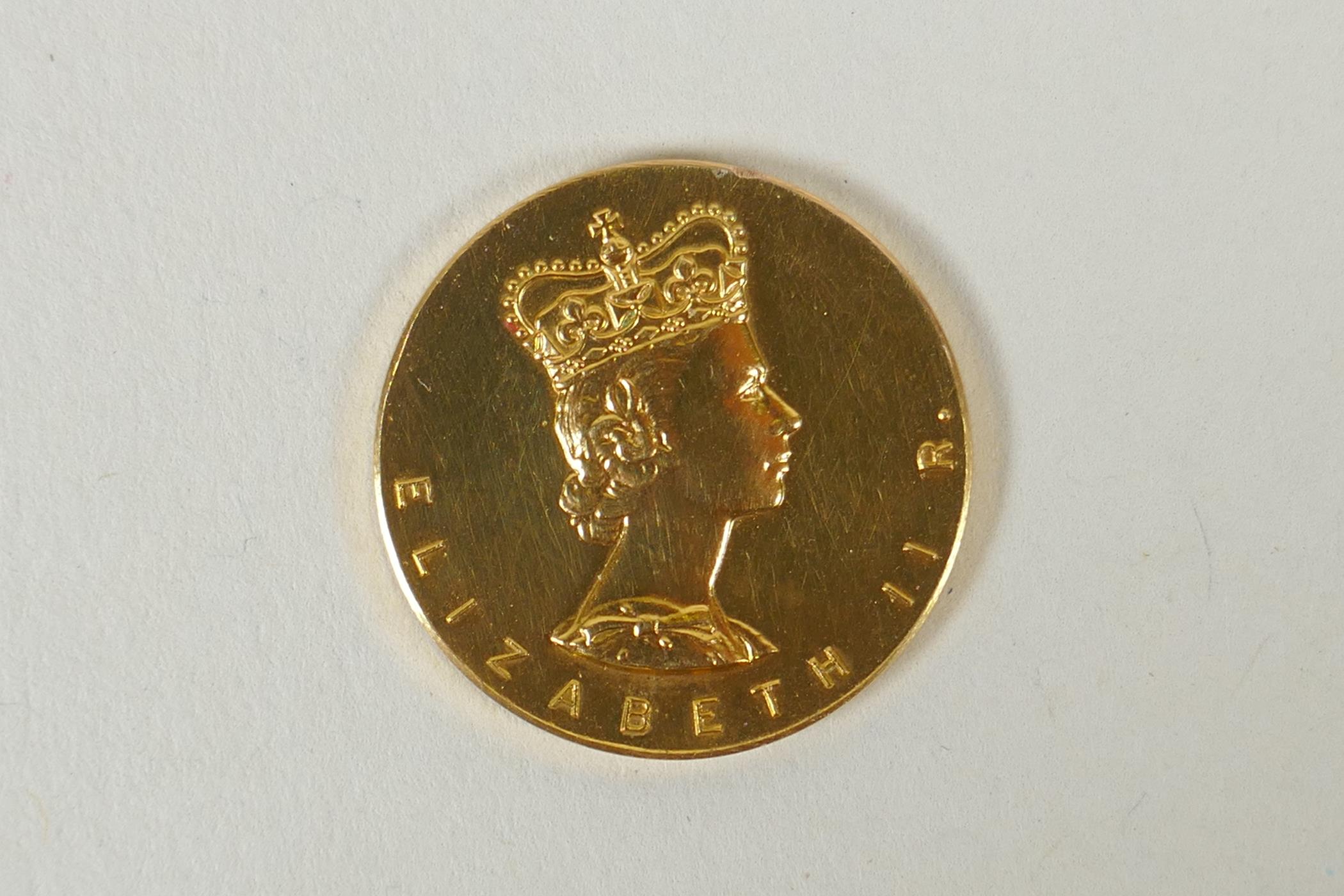 A pair of 9ct gold and silver Elizabeth II commemorative coins, in a fitted box, gold coin 6.5g, - Image 3 of 6