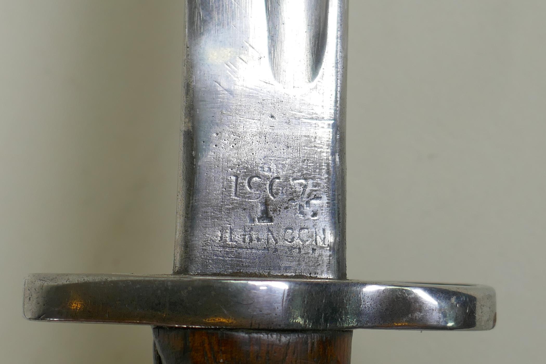 A British P1907 bayonet by Wilkinson, numerous stamps to the blade and scabbard, blade length 43cm - Image 2 of 8