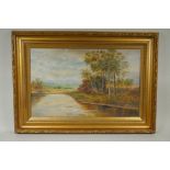 A rural riverside landscape, late C19th/C20th, indistinctly signed, oil on canvas, 56 x 36