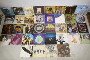 A quantity of vintage rock and pop 12" vinyl, to include Led Zeppelin, Led Zeppelin; The Beatles,