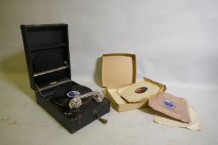 A vintage Cliftophone portable gramophone and a quantity of 1930s/40s swing and band 78s
