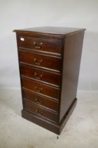 A mahogany three drawer filing cabinet, 56 x 62 x 101cm