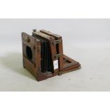 E & T Underwood, Birmingham, a mahogany cased plate camera, retailed by Benetfink & Co, 17 x 17 x