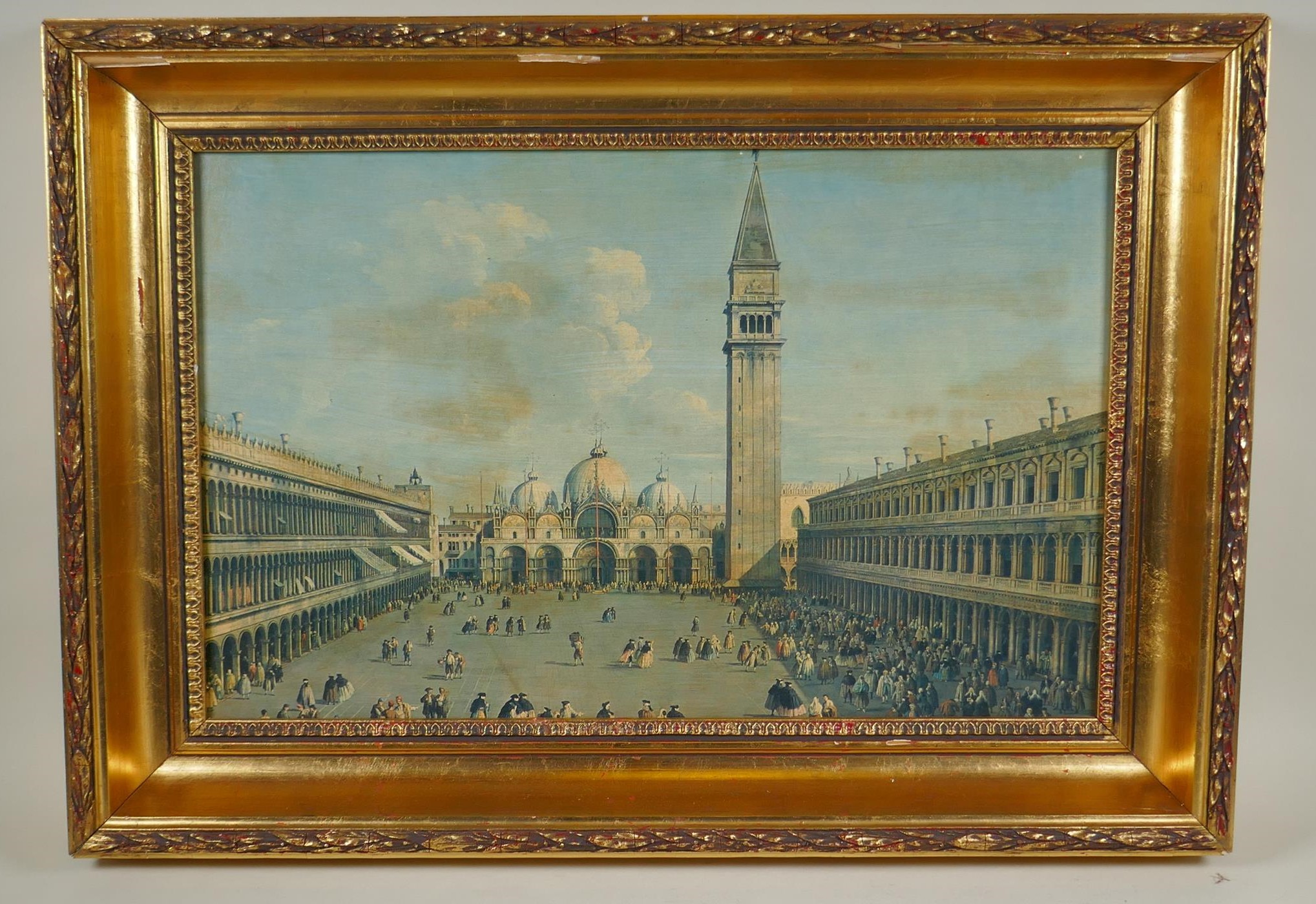 A gilt composition gallery frame, containing a print laid on board of St Mark's Square, Venice, in