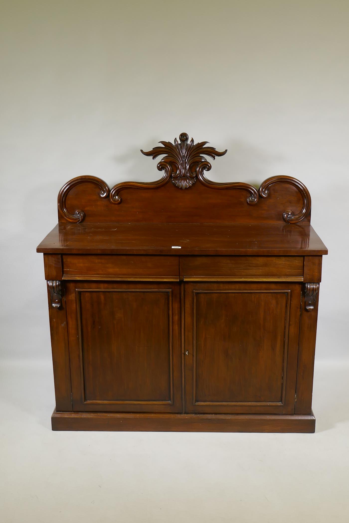 A Victorian mahogany chiffonier, the back with carved crest, the base with two frieze drawers over - Image 2 of 3