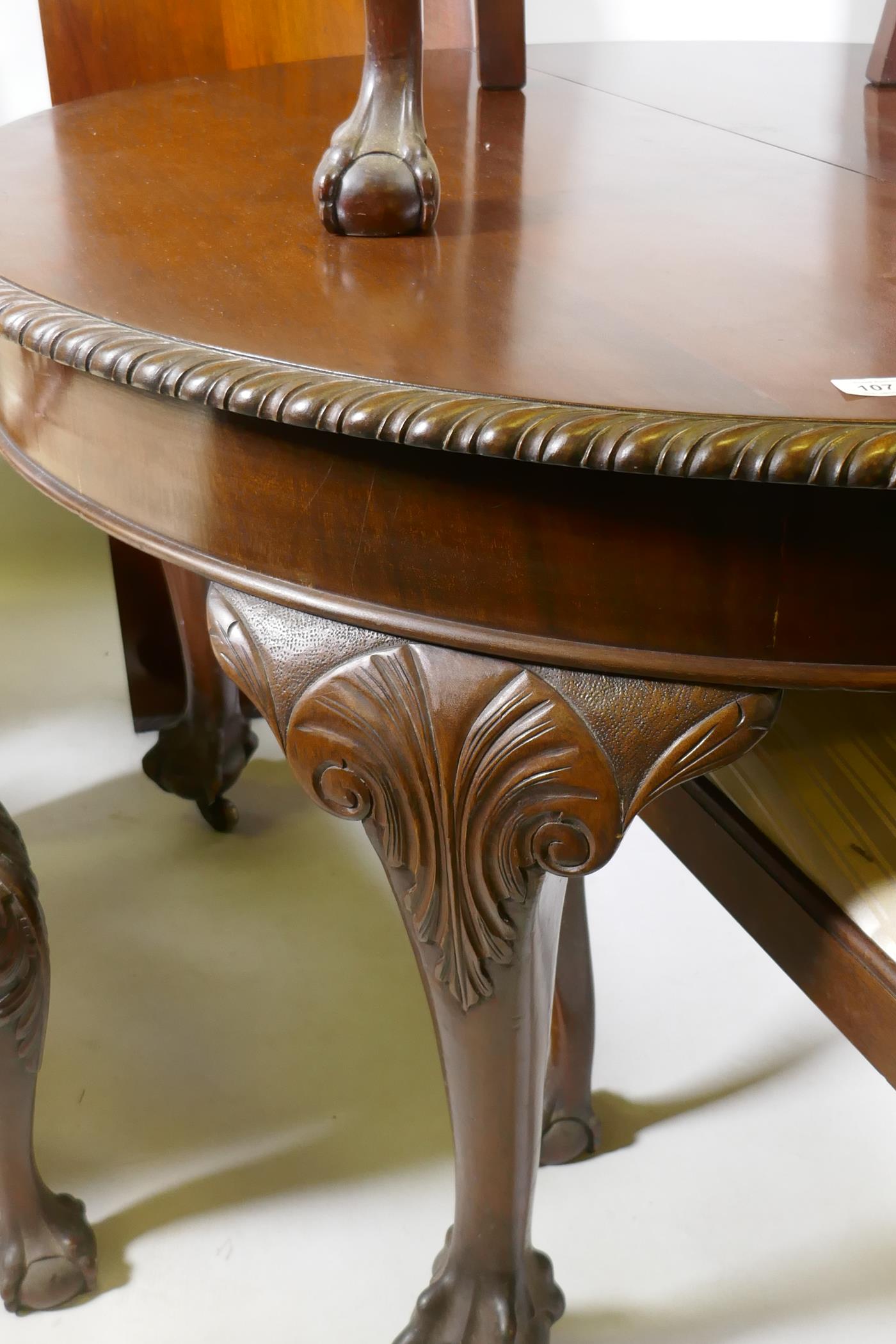 A C19th Chippendale style mahogany wind-out dining table with gadrooned edge and two leaves, - Image 4 of 4