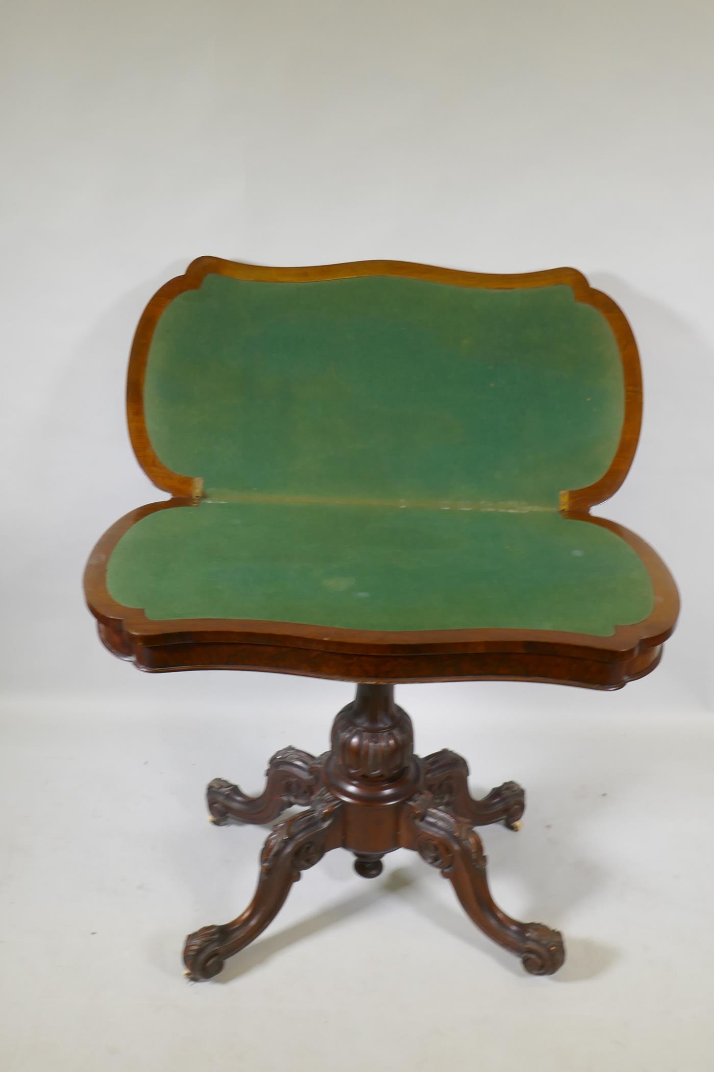 A Victorian burr walnut shaped top card table, raised on a carved and turned column and cabriole - Image 4 of 4