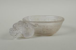 A Chinese moulded glass libation cup with dragon head decoration, 17cm