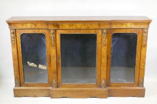 A Victorian marquetry inlaid breakfront walnut credenza with moulded frieze top over three arched