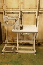 A Durkopp Adler type KO69 industrial sewing machine with bench