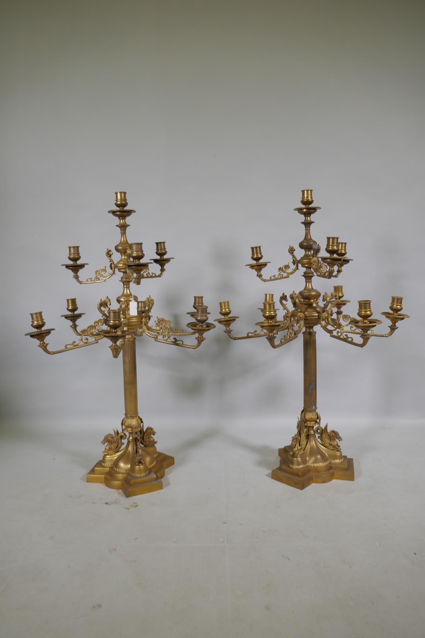 A pair of ormolu brass nine branch candelabra with ram's mask decoration, raised on fluted columns - Image 4 of 4