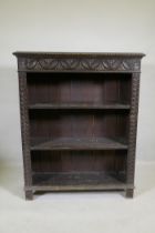 A C19th carved oak open bookcase, 91 x 30cm, 114cm high